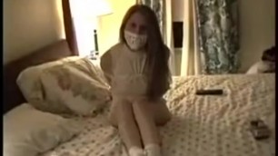 Gagged and Tied Girl Talks to Boyfriend